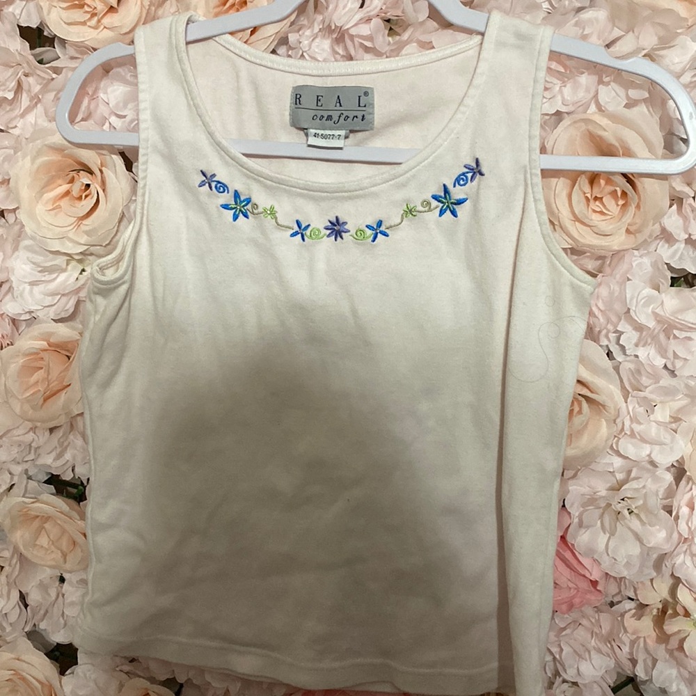 White tank with flowers on neckline